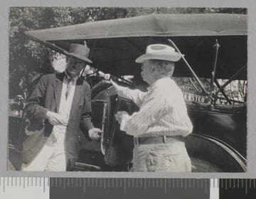 Two men and automobile