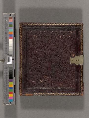 Portrait of unidentified elderly man and woman seated side-by-side