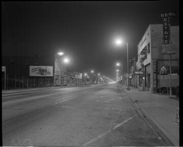 Street lighting in business district at night