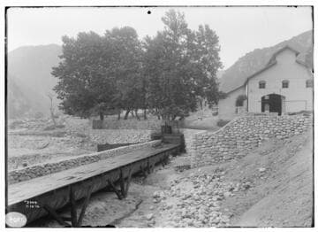 Reconstruction at SAR #2.  View of Powerhouse from downstream, across canyon, showing flume carrying tail