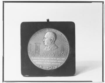 J. B. Miller Award given to Russell H. Ballard for his brilliant achievements in the company's interest