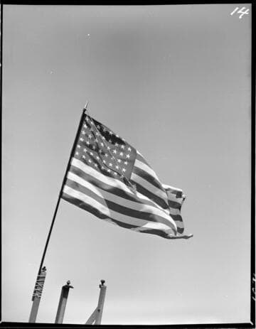 Navy E. pennant and flags at Norris Stamping Co