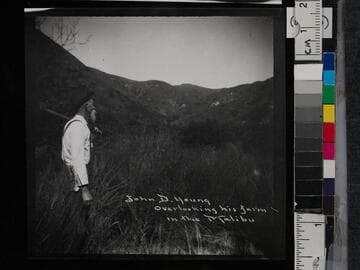 John D. Young overlooking his farm in the Malibu