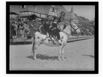 Meglin Kiddies riding a mule in front of Gables Beach Club, Santa Monica