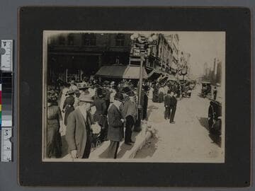 South Broadway street scene with automobiles and horse-drawn carriages, Los Angele