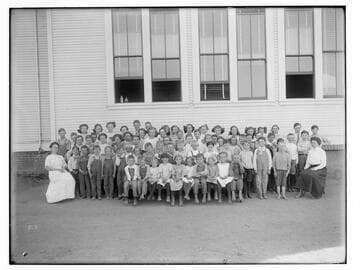 Children in front of a school, Merced County