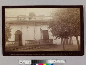 Don Pio Pico & Mrs. J. C. Carr on balcony at Ranchito, Pio's home near El Monte