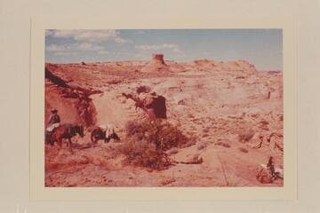 Dropping down into basin of Nasja Creek from the west. The formation at upper center appears in Marston photo 609 SJRR 5.28.8. Buck Whitehat is at left. Nasja Begay is lower right