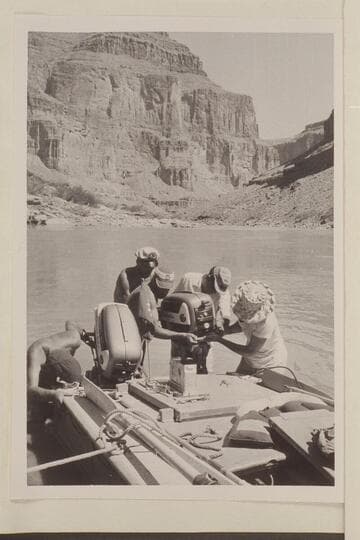 Mile 123. Repairs to "Bootoo" engines. The "Bootoo" hit the submerged island at the foot of Forster and wrecked both engines. Ed l'Anson is at left; then Brian Rowlands, Chuck Richey, and Garth Marston