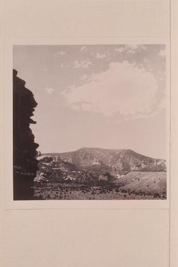 Across Trail Canyon to Navajo Mountain. Ruin at left