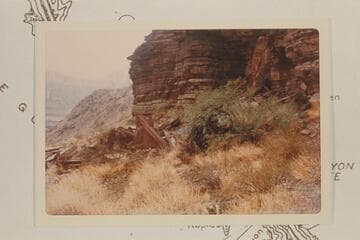 Rock-fall half covering some prehistoric Indian structures in Separation Canyon