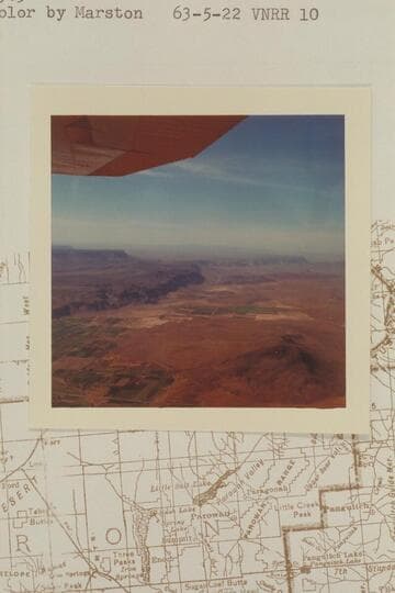Southerly along the Hurricane Cliffs from over LaVerkin Hurricane in middle distance