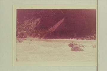 Upper Disaster Rapid. Bill Davis in the first rubber boat, Mildred Davis is handling the second boat. Photo from right bank