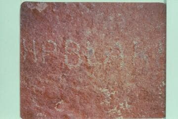 The name "H P Blake" cut near the stream at the mouth of Bridge Canyon