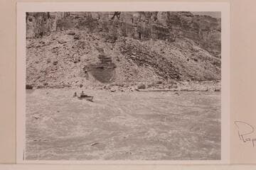 Rod Sanderson piloting the "Twin" through Badger Creek Rapid. Danny Daniels is riding forward