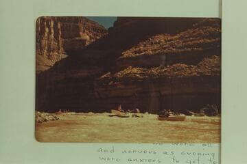 Miscue by George Wing on his first trip which aroused Nevills' violent antipathy.Flow in river is less than 1100 cfs.George Wing impinges on rock. People in boat: Pat Reilly, Susie Reilly, Wing at the oars, and Alden Smith.Photo from Nevills' boat