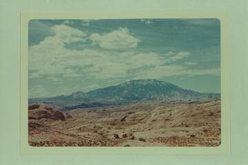 Navajo Mountain from Gray Mesa.  Trail Canyon is at left and Cha Canyon is to the right of the two dark flat tops at lower left center