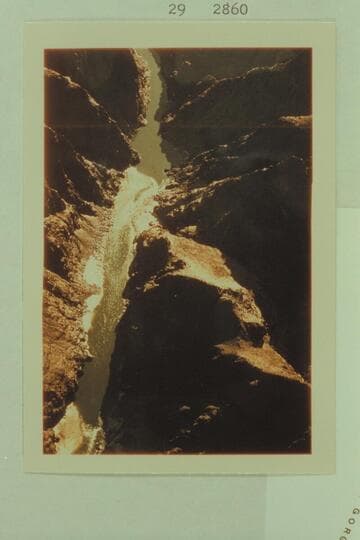 Up river to mouth of Travertine Rapid