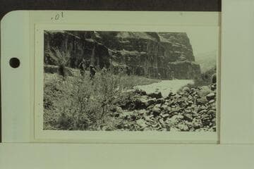 The "Esmeralda" crew checks Lava Falls from the right bank before running it. Left to right: Taylor; Robinson; and Hudson
