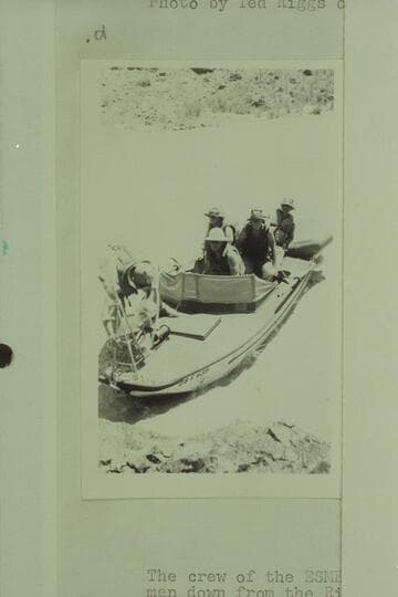 The "Esmeralda" lands at the right bank above Lava Falls.  Left to right:  Marston' Hudson at the wheel; Taylor; Edward Hudson; Bestor Robinson