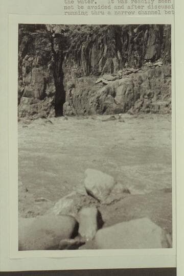 Boat of USGS party entering head of Monument Creek Rapid