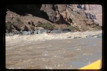 "Wee Red" climbs Vulcan Rapids