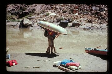 Bill Belknap portages at Soap Creek