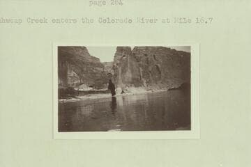 No. 119. Charles Gibbons album. Upstream view of Sentinel Rock at mouth of Wahweap