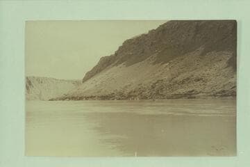 Photo from RB-MV Expedition.  Captioned:  The large talus slope across from mouth of Navajo Canyon.  It is believed that the 1776 party of Dominguez and Escalante made a dry camp (for animals) on the rim