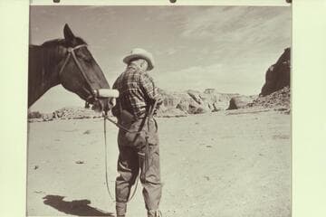 Archeyes Masland eyeing Octagon Butte for a possible arch. From area of Manygoats place in Navajo Canyon