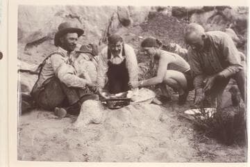Assembling boats and camp; Hite. Second from left is Loper, third from left is Sarah Fraser, fourth is Dave Rust (?)