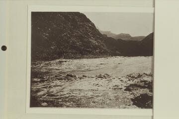 Pipe Creek Rapid in high water. Zoroaster Temple is almost hidden at upper center