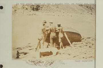 Burchard, Lint, and Kolb repairing the smashed side of the "Grand" after Freeman hit a rock in Dubendorff Rapid