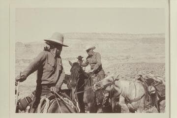 Buck Whitehat; Buster Ordiway; Archeyes Masland. On the black brush mesa north of the northeast fork of 73.6 on ride into the middle fork. Fifty Mile Mountain in background