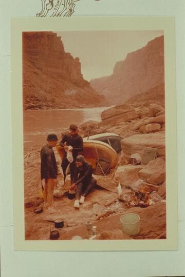 Washing dishes in the sink at Waterhole Canyon on the small beach above the entrance: Dock Marston, Buzz Belknap and Jorgen Visbak