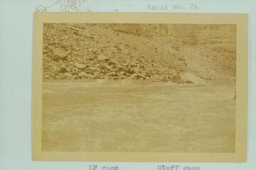 Bill Davis at head of Rapid 22. Davis caption: "Water very fast. I got on other side of big rock to be nearer center..Very noisy rapid."