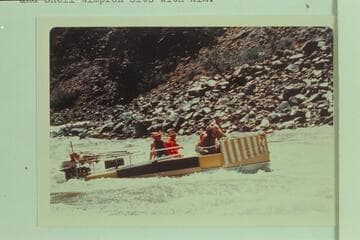 Typical cruising of the Deck-Boat in some moderately heavy water in Dubendorff Rapid.  Jim-Bob Rowland was at the wheel with Dock Marston piloting.  Jim Jordon wears the bright colored plastic and Shell Wimpfen sits with him