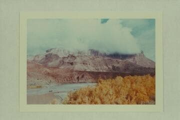 Storm draped butte from below Idas Riffle.  Filming of Disney's "The Colorado River Story."