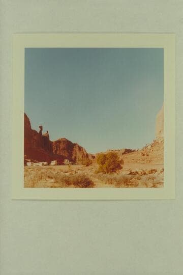 The Disney company and motor equipment at the entrance to Park Avenue and the Arches National Monument.  "The Colorado River Story" [movie]