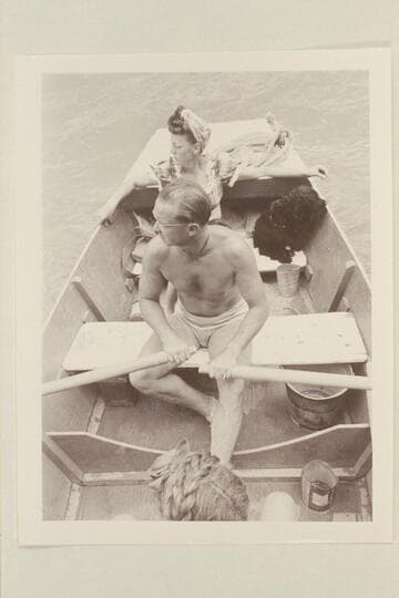 Pres and Becky Walker on the Dolores River. They are riding in the "Rainbow Trail," one of the punts used by Nevills on the dude wrangling on the San Juan River