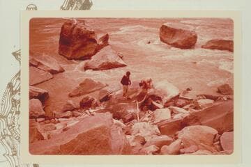 Dock Marston and Buzz Belknap examine the H. McD and the J. Best inscriptions. Mile 204 1/2, right bank