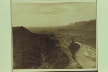 Down river from below Lees Ferry showing the fan at the mouth of the Paria at lower right and the Vermillion Cliffs upper right