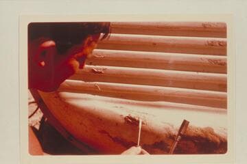 Buzz Belknap repairs his Sportyak. Camp at Mile 209.6 between Rapids #6 and #7