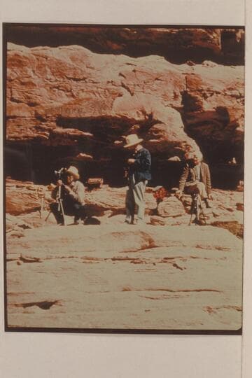 Frank Masland at the camera; Dock Marston with hand camera. Joe Desloge watches. The Needles