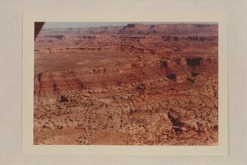 North from east of Cataract Canyon at approximately Mile 213. Junction Butte is upper center. Candlestick Tower is quarter left at the upper margin