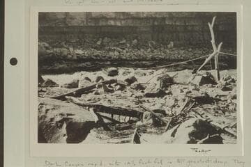The salvage operations at Dark Canyon. Tasker sits near the A frame. Lint photo copied from his album. LaRue album No. 168