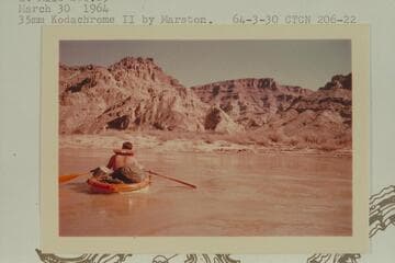 Buzz Belknap looks at the Paradox Formation in the side canyon at Mile 206.85