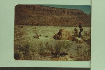 Don Wimpress and Jack Wimpress lining the "ARGO" at 13-Foot Rapid, San Juan River