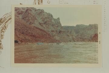 Down at Rapid #7, Mile 209.5, Cataract Canyon. The Harris-Brennan boat at center appears to be attempting a run up the rapid