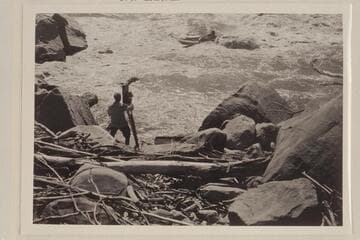 Emery Kolb photographing Ellsworth Kolb in Cataract Canyon during the USGS Cataract Canyon survey of 1921, Sep. Lint album